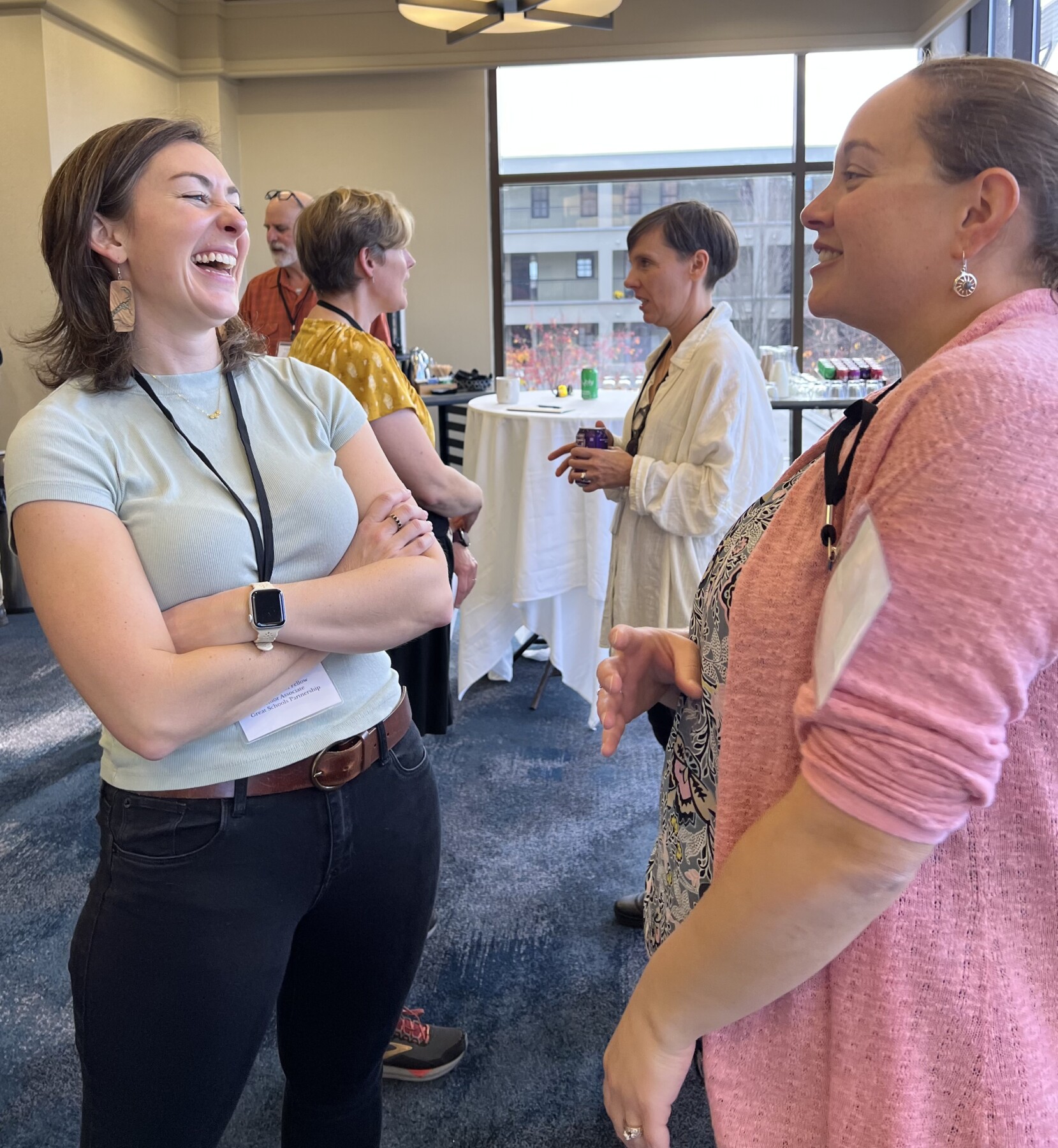 Emily & Bianca have a laugh at the All Fellows Retreat, fall 2022