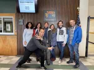 Photo of 2021 Cohort with Mike getting silly demonstrating that leaders all need to have fun. Educational leadership is joyful.