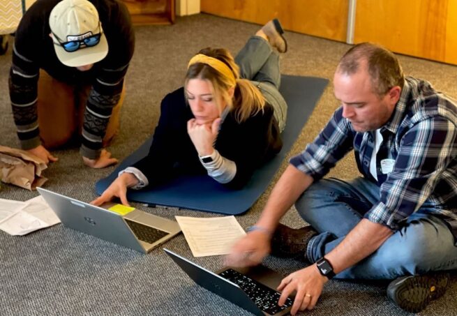 Photo: Rowland Fellows Adam Murray and Carrie Gilman share innovative, educational reform ideas with Luke Foley