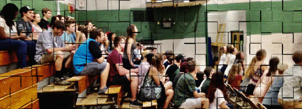 Image of students sitting on bleachers