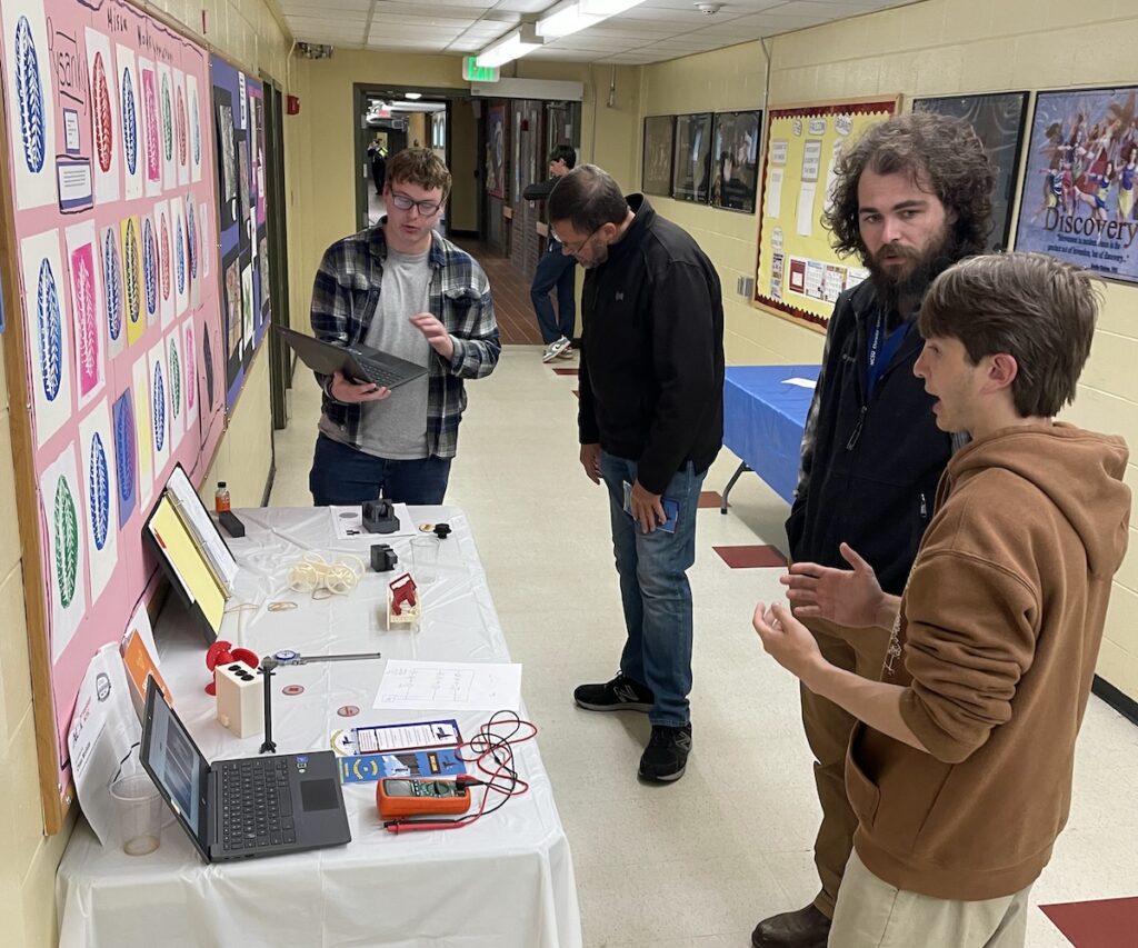 Image of North Country Career Center students present their Mechatronics and 3D printing learning to their NCUHS Teachers