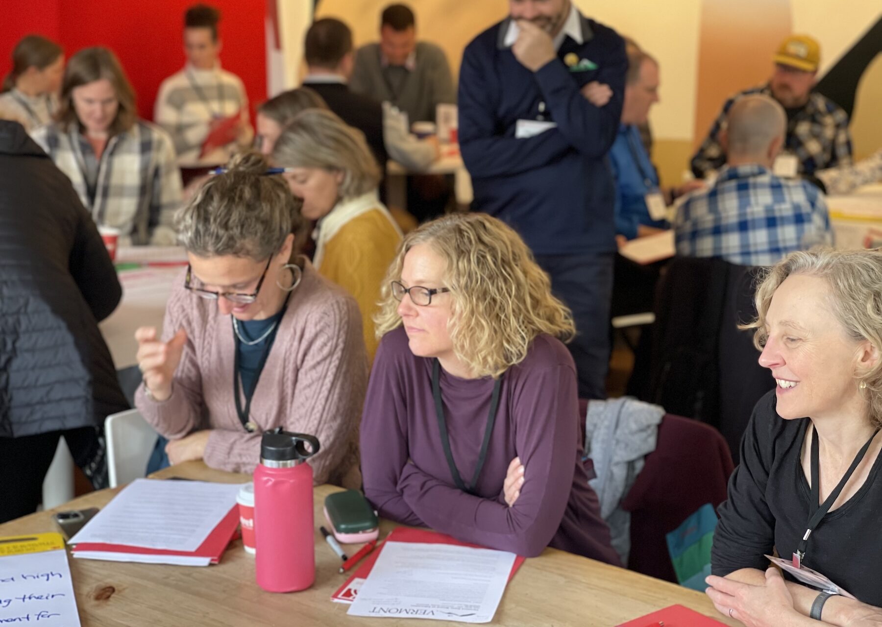 Image of group of VT educators at tables in discussion